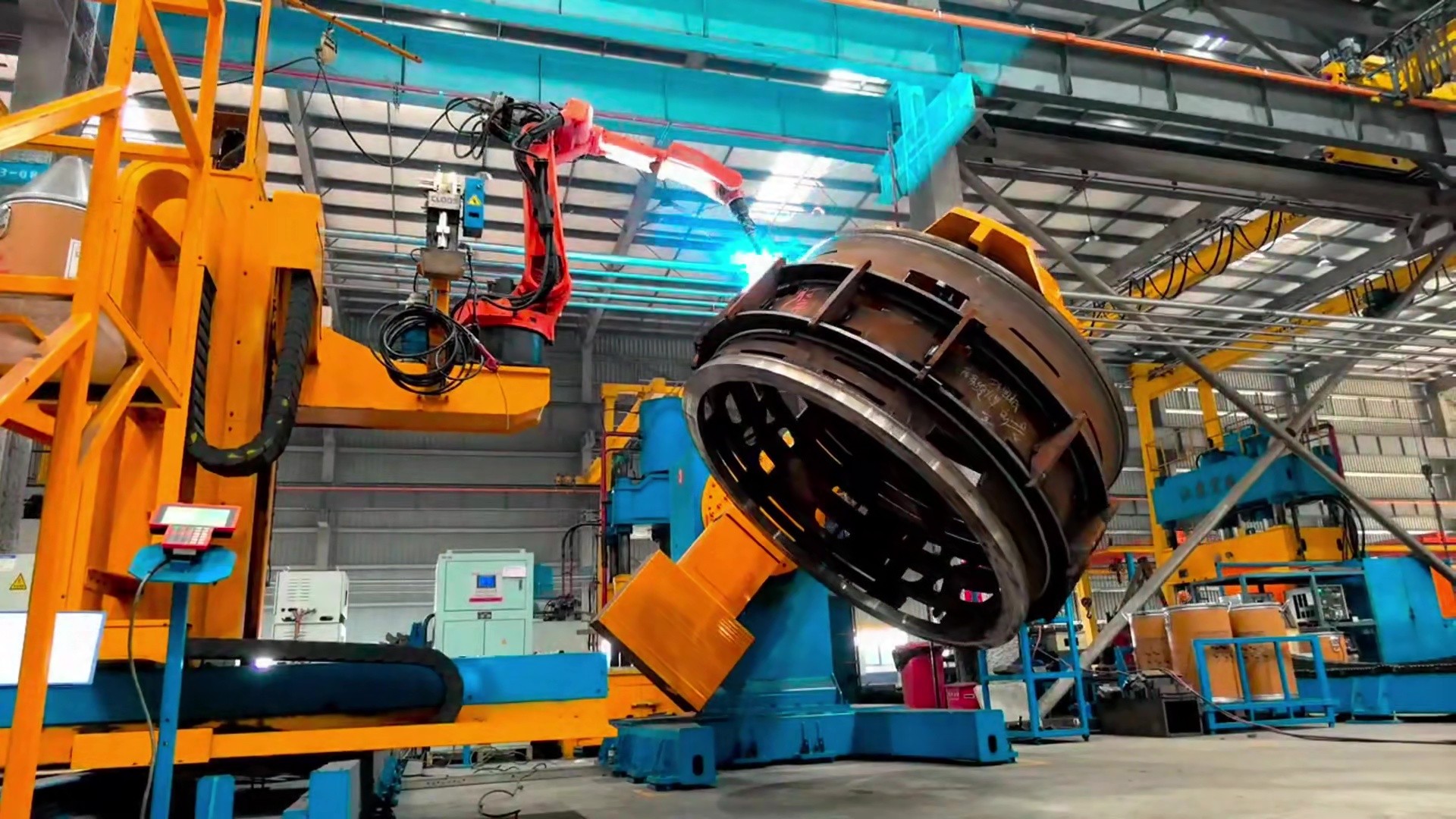 治具とポジショナーを含むロボット溶接セルの構成